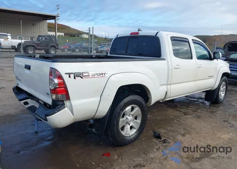 2015 Toyota Tacoma Base V6 z USA, uszkodzony, nr VIN 3TMMU4FN0FM082575